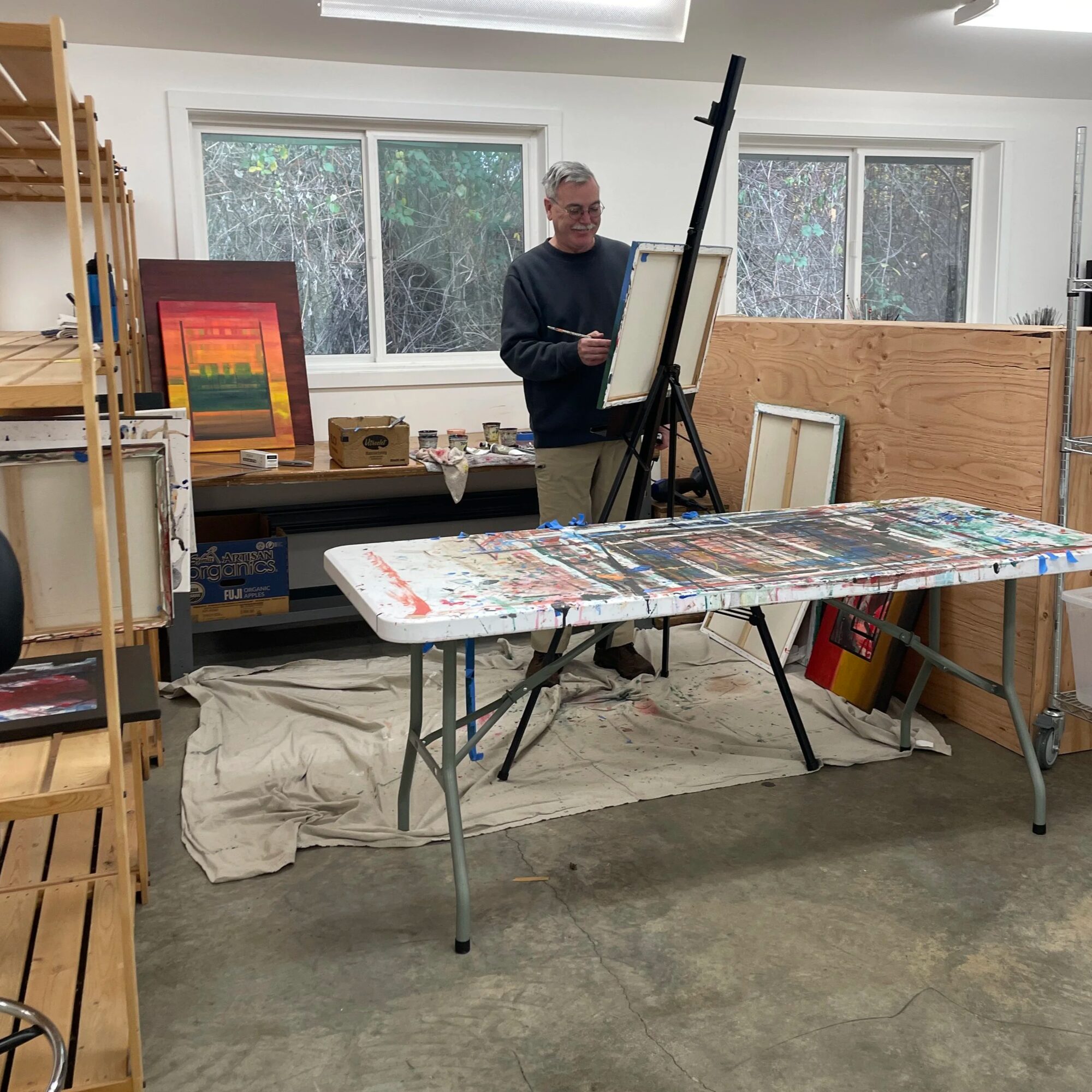 An artist at work in an Art Barn studio